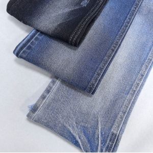 China Low Elastic Warp slub Roll Dyed Cotton Spandex Denim Fabric For Lady or Man Jeans factory