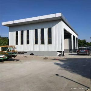 China Flat Roof Steel Structure Warehouse For Ground Service Building factory