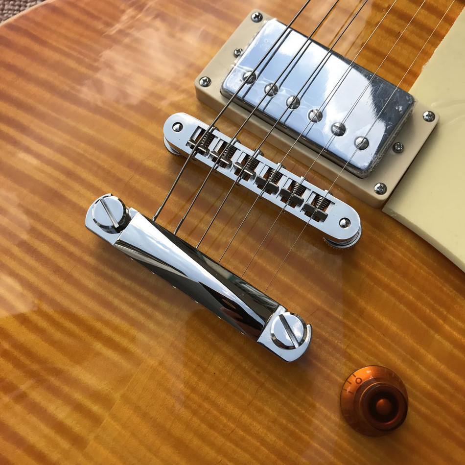 One piece of body & neck LP electric guitar Yellow tiger top adjusting the adjacent Matic bridge