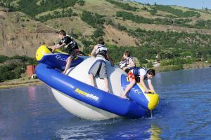 China Hot air Aquaglide Rockit Circular Inflatable Water Park Water Rocker factory