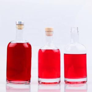 China Global Classic Round Shape 70cl 75cl Glass Bottle For Liquor With Customized Logo factory