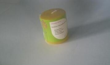 6pk Yellow Citronella scented mini pillar candle with the printed box shrinked