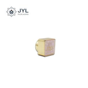 China Public Mold Zamac Perfume Cap Unique Design With Resin Decorative On Top factory