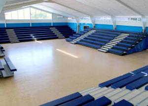 China Multi Purpose Retractable Grandstands With Leather Upholstery Bench factory