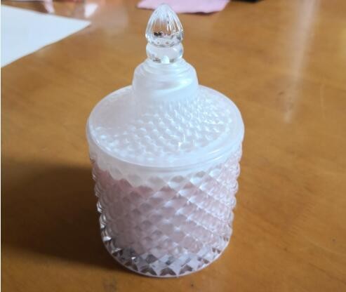 Decorative glass jar candle with peaked lid and loaded by sented soy wax of rose garden