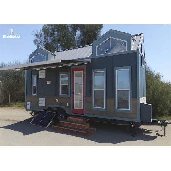 China Customized Prefab Tiny House On Wheels With Solar Panels And Sunshades Looks factory