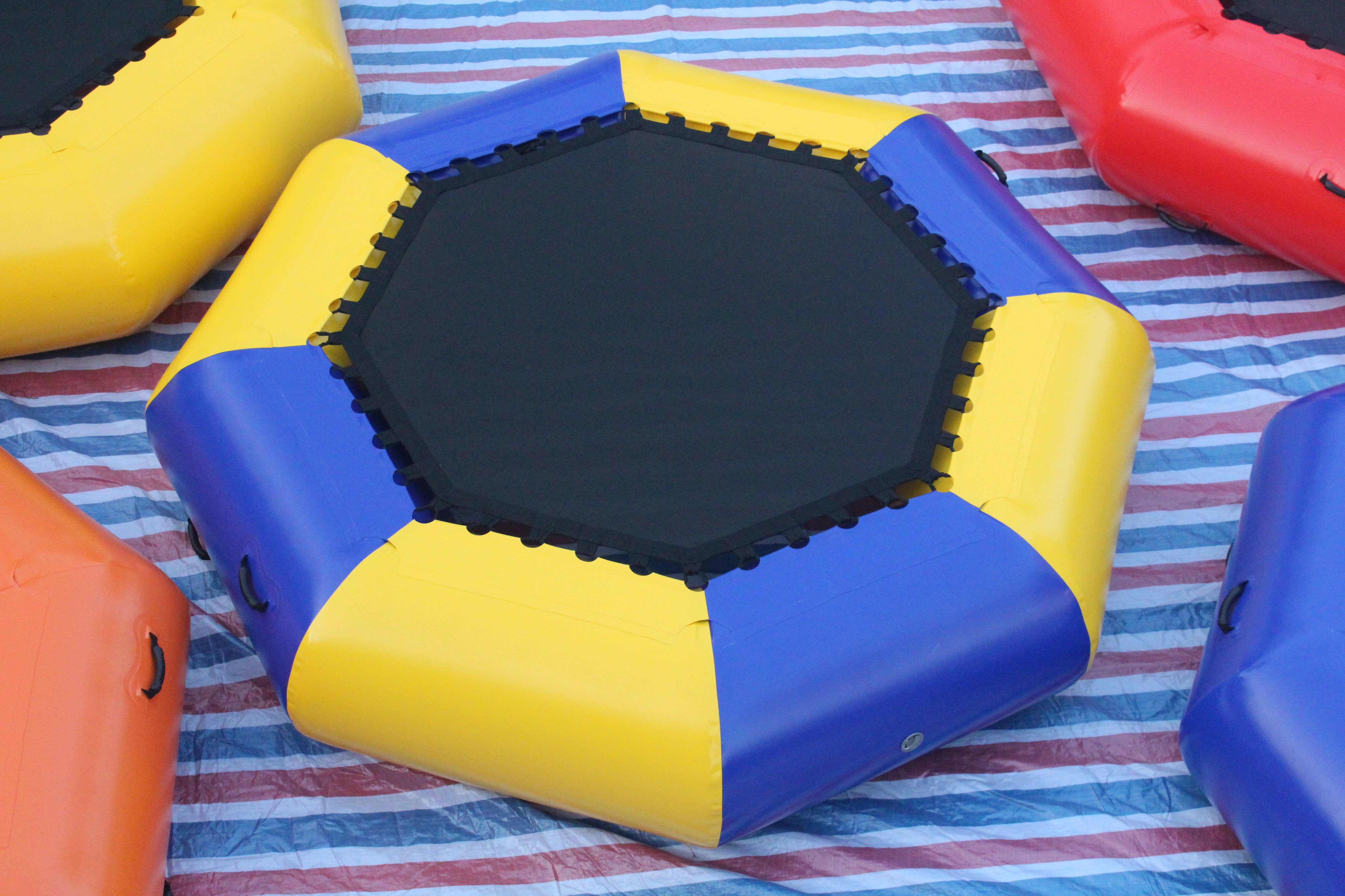 Customized Sea Or Lake 0.9mm Fireproof Inflatable Water Park Climbing Wall Slides