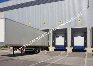 China PVC Fabric Loading Dock Sectional Seal Lifting Industrial Garage Doors With Remote Operations factory