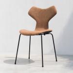 Brown Custom Upholstered Dining Chair With Horn Seat Back Design