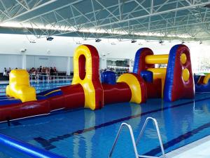 China Commercial Aqua Fun Inflatable Slide / Water Blow Up Obstacle Course For Swimming Pool factory