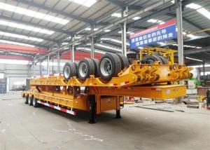 China Gooseneck Tri Axles 4 Axle 70 80 Ton Low Deck Semi Low Bed Trailer factory