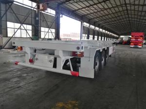 China 3 Axle Blue Flatbed Semi Trailer 2×20Feet Or 40Feet For Container Carrying 50-60Tons factory