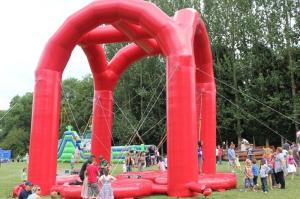 China Safe 4 Person Adult Inflatable Games Red Inflatable Bungee Jumping factory