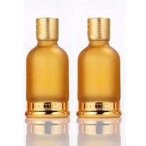 China Luxury Gold Dropper Frosted Glass Essential Oil Bottle Round Shape factory
