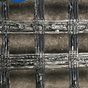 China 50kn/M-200kn/M Self Adhesive Fiberglass Geogrid With Asphalt Coating factory