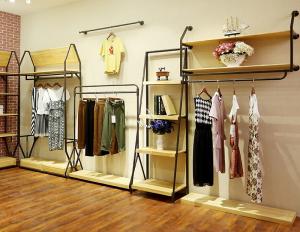 China Durable Lady'S Clothing Display Racks Shop Clothes Rack Fashionable Design factory