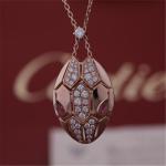 Roman Serpenti necklace in 18 kt rose gold set with rubellite eyes and with pavé