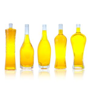 China Custom Cap 500ml 700ml 750ml Unique Shape Glass Bottle for Rum Vodka Whisky Tequila Gin factory