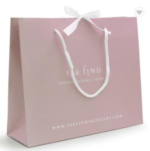 China Biodegradable Spot UV Printed Paper Shopping Bags factory
