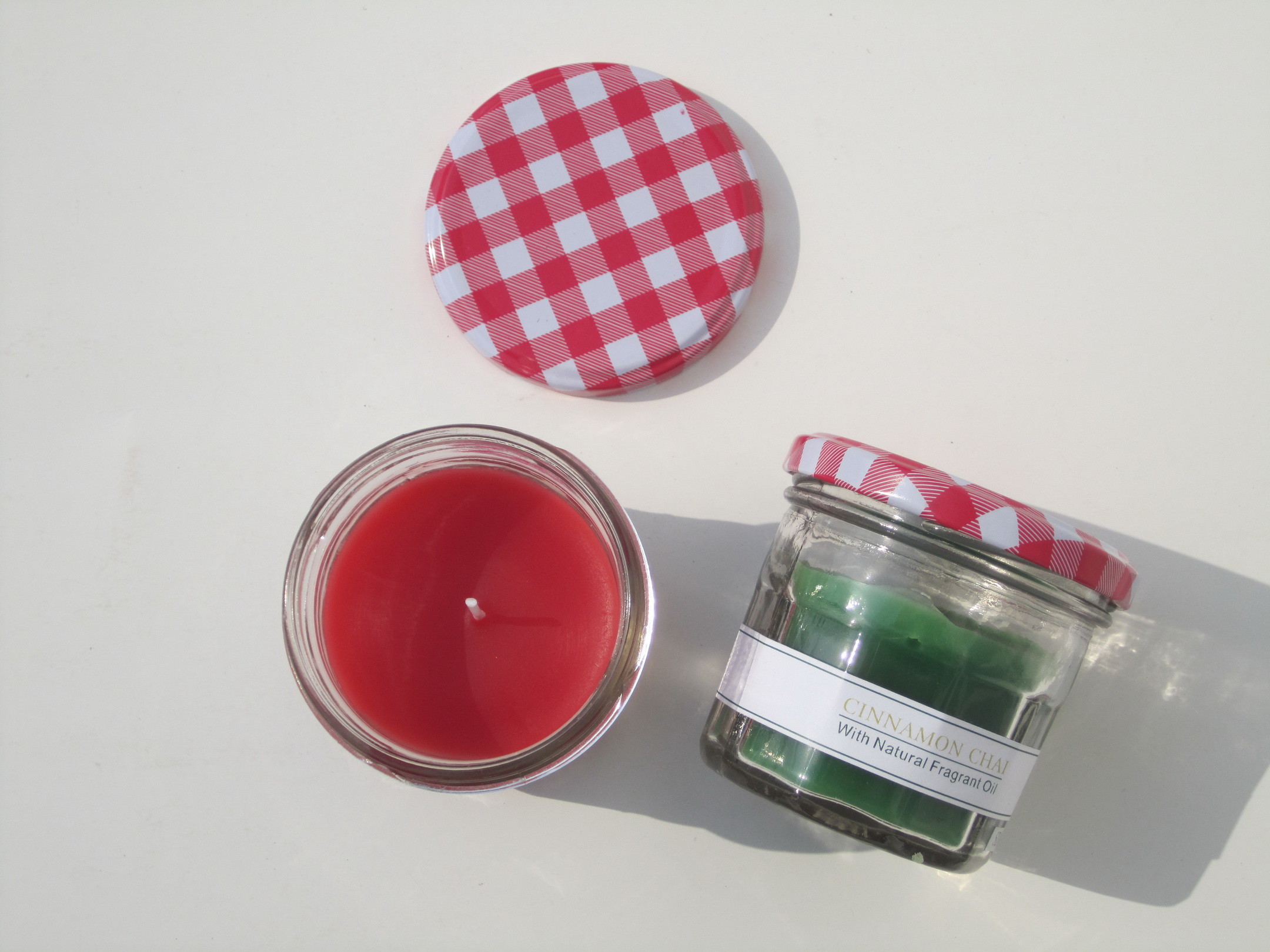 Red & Green Round scented glass candle with printed metal lid and printed label and packed into gift box