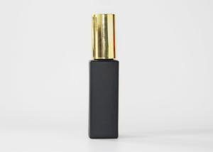 China Luxury 1 OZ Empty Glass Pump Bottles Matte Black Color For Face Essential Serum factory